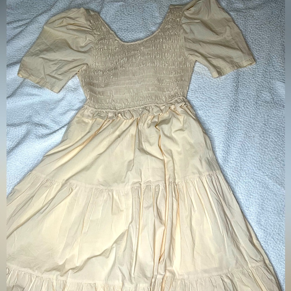 Cut out tie back cream summer dress from boutique.
